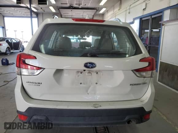 2020 Subaru Forester z VIN JF2SKADC4LH575433, wystawiony jako Copart lot #65171075 z przebiegiem 27 673 mil mil oraz Szkoda całkowita • Salvage title. Historia ofert i sprzedaży dostępna na DreamBid. Obrazek 6.