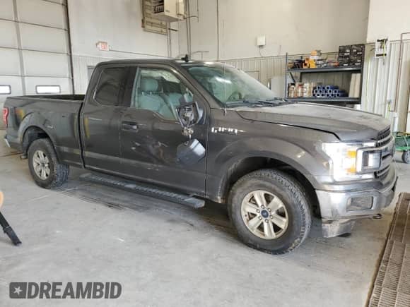2019 Ford F-150 XL z VIN 1FTEX1EP8KFA96988, wystawiony jako Copart lot #71524395 z przebiegiem 149 644 mil mil oraz Szkoda całkowita • Salvage title. Historia ofert i sprzedaży dostępna na DreamBid. Obrazek 4.