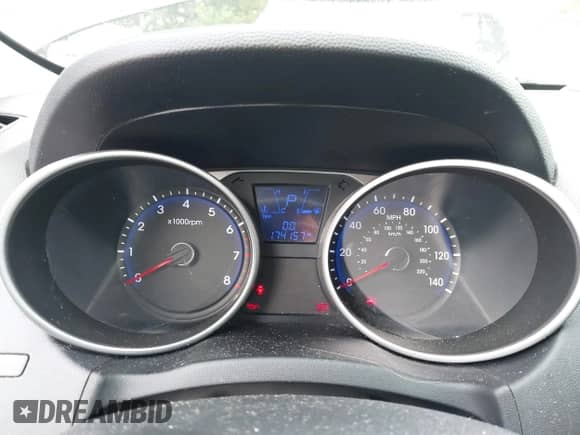 2015 Hyundai Tucson SE z VIN KM8JU3AGXFU987693, wystawiony jako IAAI lot #42989626 z przebiegiem 174 157 mil mil oraz . Historia ofert i sprzedaży dostępna na DreamBid. Obrazek 7.