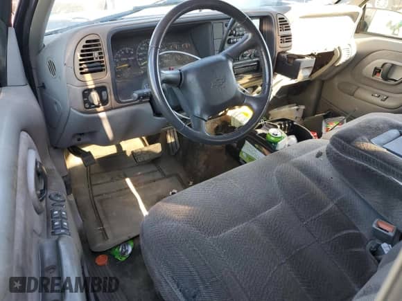 1999 Chevrolet Tahoe Z71 z VIN 1GNEK13R7XJ559475, wystawiony jako Copart lot #80427044 z przebiegiem 210 136 mil mil oraz Szkoda całkowita • Salvage title. Historia ofert i sprzedaży dostępna na DreamBid. Obrazek 8.