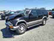 1999 Chevrolet Blazer LT z VIN 1GNDT13W4X2248675, wystawiony jako Copart lot #59103635 z przebiegiem 105 827 mil mil oraz Szkoda całkowita • Salvage title. Historia ofert i sprzedaży dostępna na DreamBid. Obrazek 1.