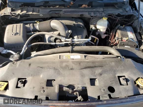 2014 Ram 1500 Tradesman z VIN 1C6RR6FT9ES455627, wystawiony jako Copart lot #67121715 z przebiegiem 194 161 mil mil oraz Szkoda całkowita • Salvage title. Historia ofert i sprzedaży dostępna na DreamBid. Obrazek 11.