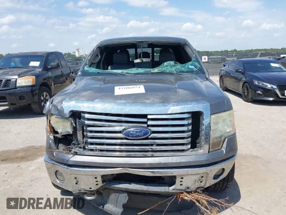 2011 Ford F-150 XLT z VIN 1FTFW1ET2BFC27398, wystawiony jako IAAI lot #43106954 z przebiegiem 191 159 mil mil oraz . Historia ofert i sprzedaży dostępna na DreamBid. Obrazek 12.