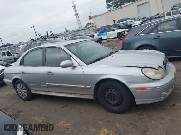 2003 Hyundai Sonata with VIN KMHWF25H23A858454, listed as a IAAI auction lot 42016877 with 135,539 mi miles and . Bid and sale history available at DreamBid. Image 13.
