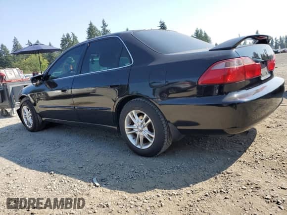 1998 Honda Accord EX with VIN 1HGCG1658WA049839, listed as a Copart auction lot 71241095 with 253,051 mi miles and Salvage title. Bid and sale history available at DreamBid. Image 2.