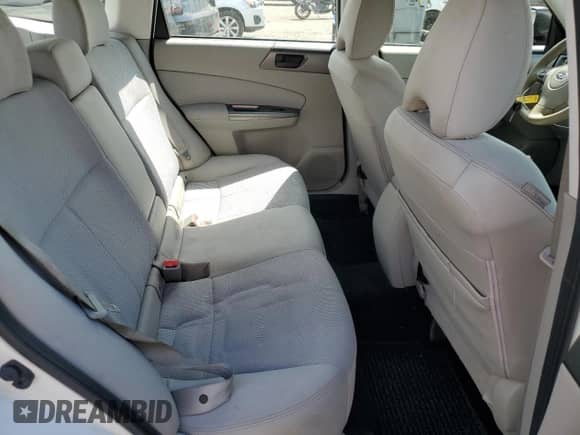 2013 Subaru Forester X z VIN JF2SHABC0DG424937, wystawiony jako Copart lot #70748745 z przebiegiem 149 471 mil mil oraz Szkoda całkowita • Salvage title. Historia ofert i sprzedaży dostępna na DreamBid. Obrazek 11.