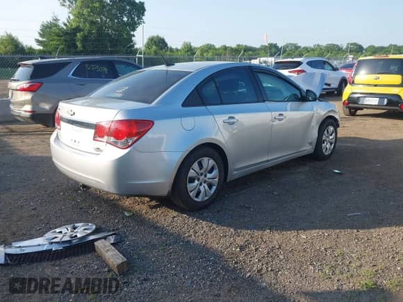 2014 Chevrolet Cruze LS with VIN 1G1PB5SH5E7370523, listed as a IAAI auction lot 42547745 with 64,602 mi miles and . Bid and sale history available at DreamBid. Image 4.