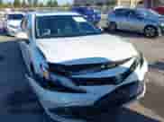 2021 Toyota Camry Hybrid XLE with VIN 4T1F31AK3MU567000, listed as a IAAI auction lot 43279629 with 132,796 mi miles and . Bid and sale history available at DreamBid. Image 6.