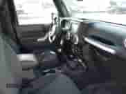 2015 Jeep Wrangler Sport with VIN 1C4AJWAG9FL769863, listed as a IAAI auction lot 43322956 with 123,518 mi miles and . Bid and sale history available at DreamBid. Image 5.