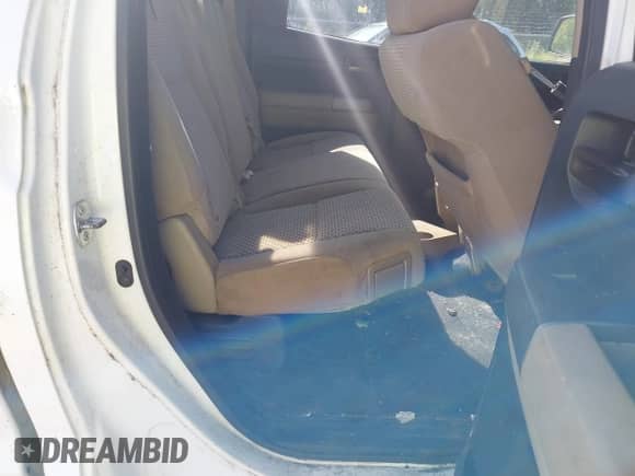 2012 Toyota Tundra z VIN 5TFRU5F15CX026386, wystawiony jako IAAI lot #42588467 z przebiegiem 256 381 mil mil oraz . Historia ofert i sprzedaży dostępna na DreamBid. Obrazek 8.