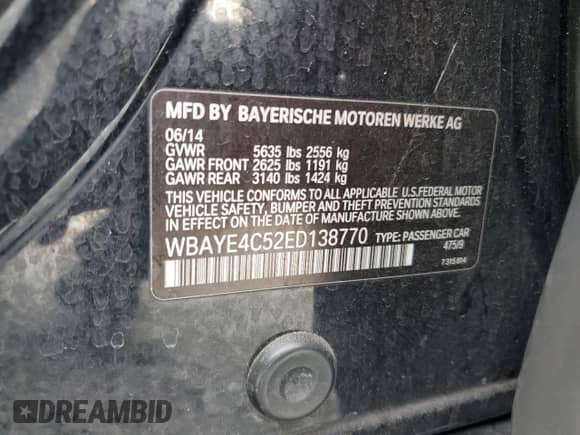 2014 BMW 7 Series 740Li with VIN WBAYE4C52ED138770, listed as a Copart auction lot 53647665 with 106,827 mi miles and Salvage title. Bid and sale history available at DreamBid. Image 12.