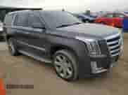 2015 Cadillac Escalade Luxury with VIN 1GYS4BKJ7FR174077, listed as a Copart auction lot 68317665 with 107,903 mi miles and Salvage title. Bid and sale history available at DreamBid. Image 4.