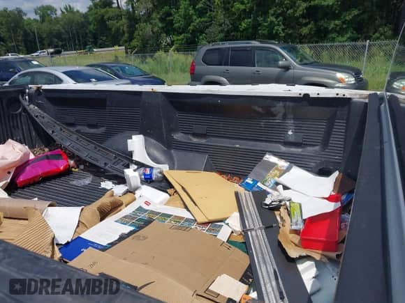 2012 Ford F-150 XL with VIN 1FTNF1CF6CKD16747, listed as a IAAI auction lot 42671752 with 165,935 mi miles and . Bid and sale history available at DreamBid. Image 8.