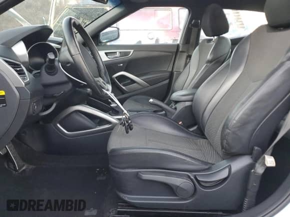 2016 Hyundai Veloster с VIN KMHTC6AD0GU298346, выставлен на аукционе Copart как лот 81289574 с пробегом 87 540 миль миль и Списание • Salvage title. История ставок и продаж доступна на DreamBid. Изображение 7.