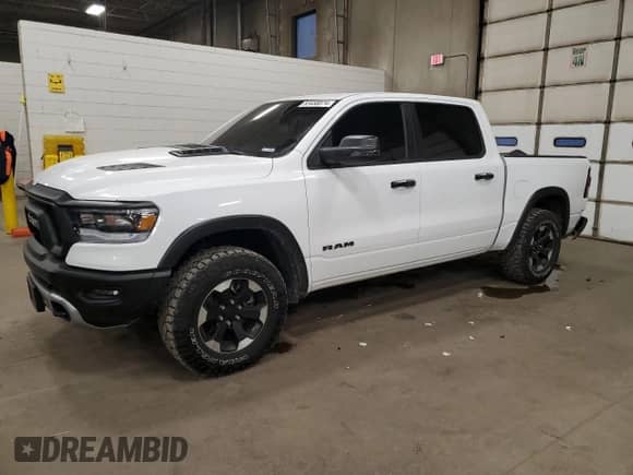 2024 Ram 1500 Rebel z VIN 1C6SRFLT5RN208244, wystawiony jako Copart lot #83458874 z przebiegiem 6 193 mil mil oraz Szkoda całkowita • Salvage title. Historia ofert i sprzedaży dostępna na DreamBid. Obrazek 1.