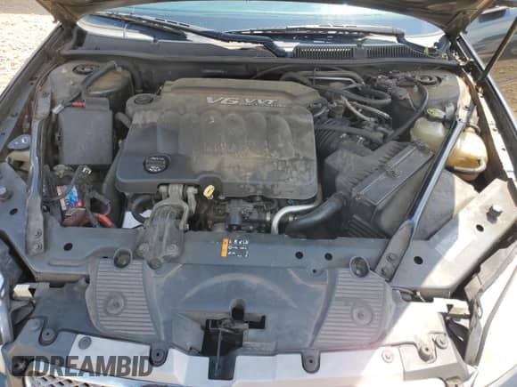 2013 Chevrolet Impala LT z VIN 2G1WG5E36D1233633, wystawiony jako Copart lot #69065735 z przebiegiem 183 633 mil mil oraz Szkoda całkowita • Salvage title. Historia ofert i sprzedaży dostępna na DreamBid. Obrazek 11.