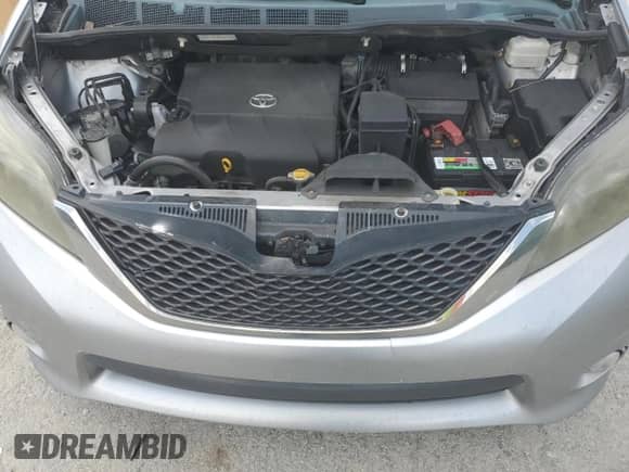 2012 Toyota Sienna SE with VIN 5TDXK3DC5CS259339, listed as a Copart auction lot 68835155 with 266,868 mi miles and Salvage title. Bid and sale history available at DreamBid. Image 12.