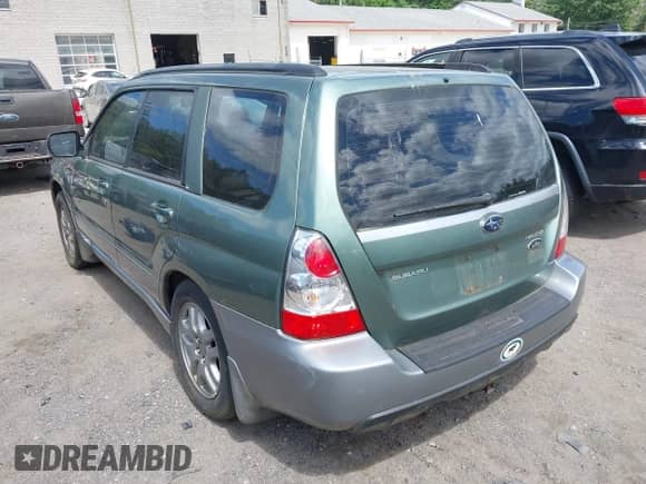 2007 Subaru Forester X L.L. Bean with VIN JF1SG67657H718176, listed as a IAAI auction lot 42542406 with 108,202 mi miles and . Bid and sale history available at DreamBid. Image 3.