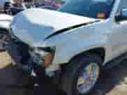 2010 Chevrolet Tahoe LTZ z VIN 1GNUCCE04AR277838, wystawiony jako IAAI lot #42854131 z przebiegiem 161 680 mil mil oraz . Historia ofert i sprzedaży dostępna na DreamBid. Obrazek 19.