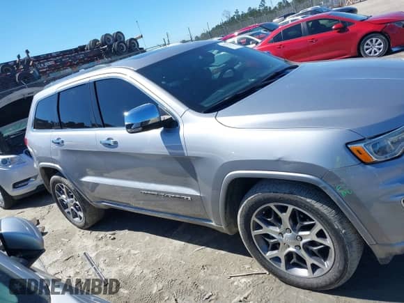 2020 Jeep Grand Cherokee High Altitude with VIN 1C4RJECG6LC129096, listed as a IAAI auction lot 41740774 with 93,988 mi miles and . Bid and sale history available at DreamBid. Image 13.