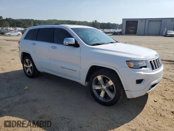 2015 Jeep Grand Cherokee Overland with VIN 1C4RJECG2FC614713, listed as a Copart auction lot 66356495 with 164,832 mi miles and Salvage title. Bid and sale history available at DreamBid. Image 4.