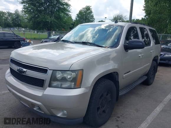 2007 Chevrolet Tahoe LTZ z VIN 1GNFK130X7R265057, wystawiony jako IAAI lot #42734796 z przebiegiem 202 776 mil mil oraz . Historia ofert i sprzedaży dostępna na DreamBid. Obrazek 2.