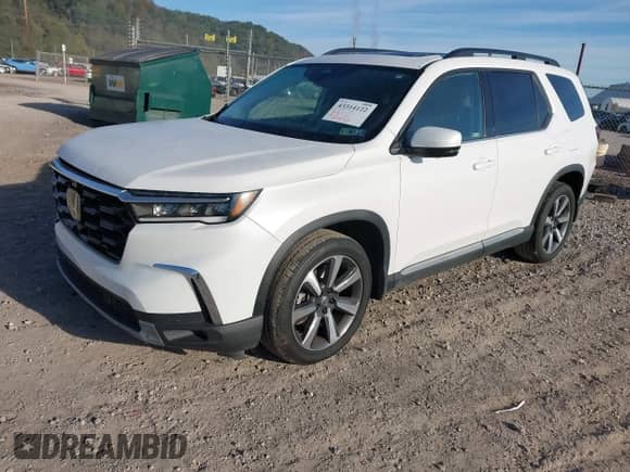 2025 Honda Pilot Elite with VIN 5FNYG1H81SB025573, listed as a IAAI auction lot 43314122 with 20,404 mi miles and . Bid and sale history available at DreamBid. Image 18.