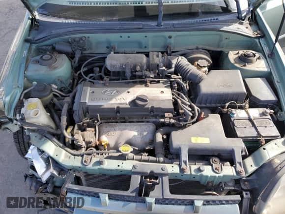 2003 Hyundai Accent GL z VIN KMHCG35CX3U242820, wystawiony jako Copart lot #45971325 z przebiegiem 132 192 mil mil oraz Szkoda całkowita • Salvage title. Historia ofert i sprzedaży dostępna na DreamBid. Obrazek 11.