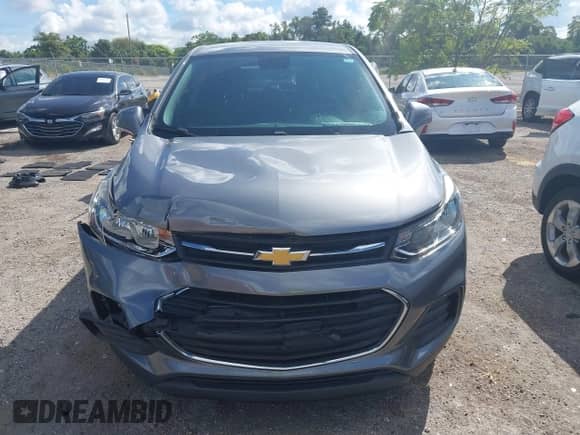 2020 Chevrolet Trax LS with VIN 3GNCJKSB8LL145936, listed as a IAAI auction lot 43311403 with 92,852 mi miles and . Bid and sale history available at DreamBid. Image 12.