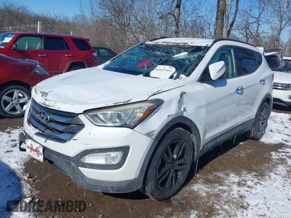 2014 Hyundai Santa Fe z VIN 5XYZUDLA6EG198589, wystawiony jako IAAI lot #41627953 z przebiegiem 155 556 mil mil oraz . Historia ofert i sprzedaży dostępna na DreamBid. Obrazek 6.