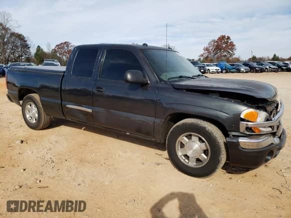 2005 GMC Sierra 1500 SLT with VIN 1GTEC19T55Z241863, listed as a Copart auction lot 82548374 with 249,145 mi miles and Salvage title. Bid and sale history available at DreamBid. Image 4.