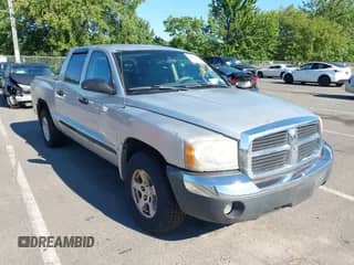2005 Dodge Dakota SLT with VIN 1D7HW48N05S177433, listed as a IAAI auction lot 43024048 with 141,066 mi miles and . Bid and sale history available at DreamBid. Image 1.