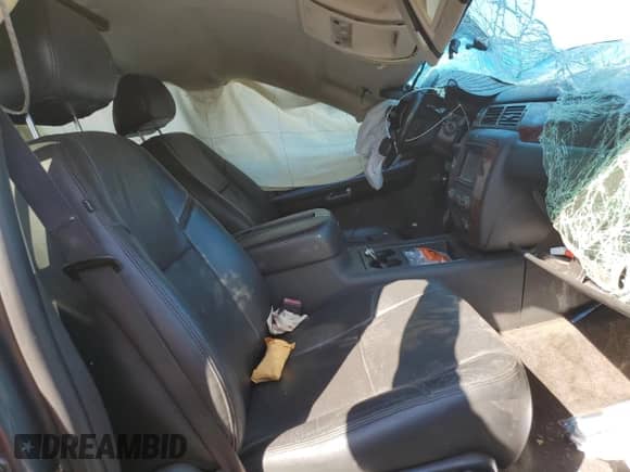 2009 Chevrolet Tahoe 1LT with VIN 1GNFC23059J101557, listed as a Copart auction lot 70664105 with Not provided miles and Salvage title. Bid and sale history available at DreamBid. Image 7.