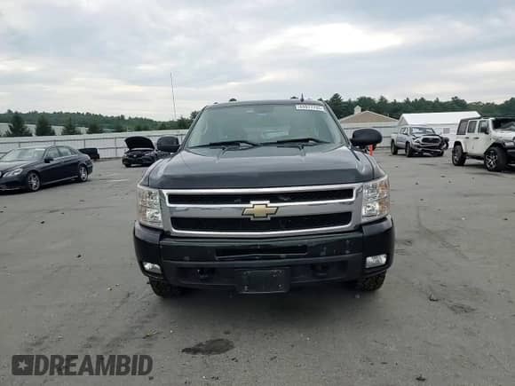 2011 Chevrolet Silverado 1500 LTZ z VIN 1GCRKTE3XBZ172556, wystawiony jako Copart lot #65977755 z przebiegiem Nie podano mil oraz Szkoda całkowita • Salvage title. Historia ofert i sprzedaży dostępna na DreamBid. Obrazek 13.