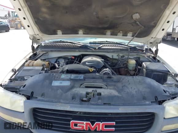 2002 GMC Sierra 1500 SLE z VIN 1GTEK14T12Z313681, wystawiony jako IAAI lot #43052983 z przebiegiem Nie podano mil oraz . Historia ofert i sprzedaży dostępna na DreamBid. Obrazek 10.