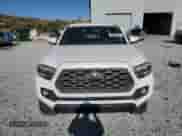 2022 Toyota Tacoma SR z VIN 3TYSZ5ANXNT090384, wystawiony jako Copart lot #80906685 z przebiegiem Nie podano mil oraz Szkoda całkowita • Salvage title. Historia ofert i sprzedaży dostępna na DreamBid. Obrazek 5.