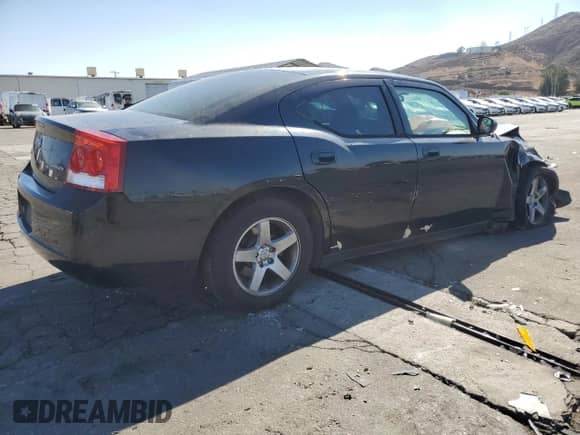 2009 Dodge Charger SE с VIN 2B3KA43D49H500443, выставлен на аукционе Copart как лот 82191155 с пробегом 168 293 миль миль и Списание • Salvage title. История ставок и продаж доступна на DreamBid. Изображение 3.