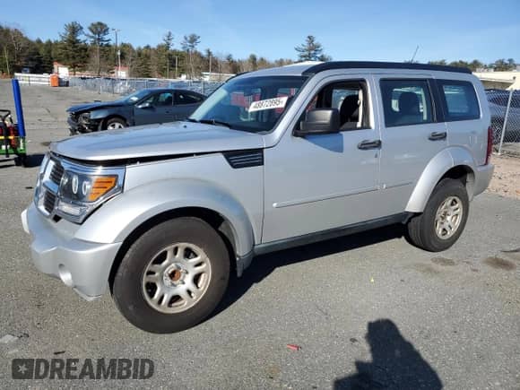2011 Dodge Nitro SE with VIN 1D4PT2GK2BW520275, listed as a Copart auction lot 50867405 with 267,096 mi miles and Salvage title. Bid and sale history available at DreamBid. Image 1.