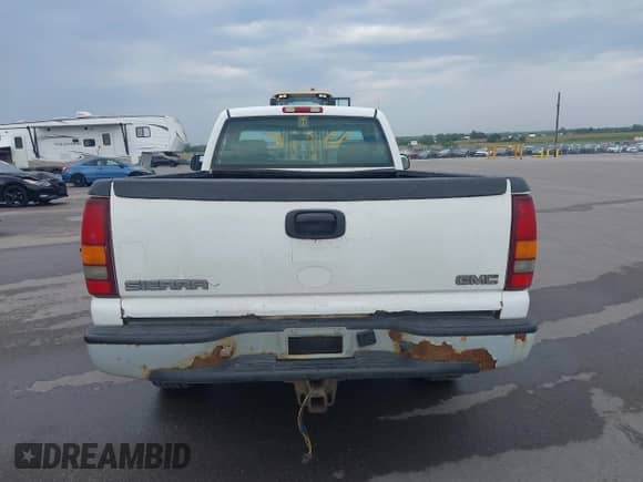 2002 GMC Sierra 1500 SLE z VIN 1GTEK14T12Z313681, wystawiony jako IAAI lot #43052983 z przebiegiem Nie podano mil oraz . Historia ofert i sprzedaży dostępna na DreamBid. Obrazek 16.