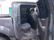 2013 Nissan Frontier SV with VIN 1N6AD0EV5DN734619, listed as a IAAI auction lot 41300993 with 104,013 mi miles and . Bid and sale history available at DreamBid. Image 8.