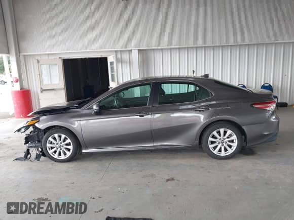 2019 Toyota Camry SE z VIN 4T1B11HK8KU763229, wystawiony jako IAAI lot #43320855 z przebiegiem 99 256 mil mil oraz . Historia ofert i sprzedaży dostępna na DreamBid. Obrazek 13.