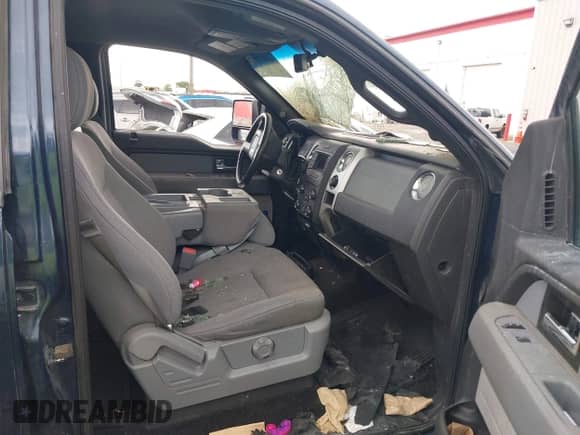 2014 Ford F-150 FX4 with VIN 1FTFW1ET9EKF58099, listed as a IAAI auction lot 42827623 with Not provided miles and . Bid and sale history available at DreamBid. Image 4.