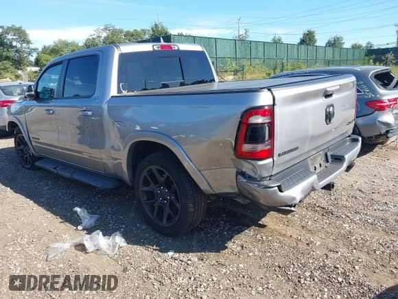 2022 Ram 1500 Laramie z VIN 1C6SRFJT3NN188430, wystawiony jako IAAI lot #43078067 z przebiegiem 26 073 mil mil oraz . Historia ofert i sprzedaży dostępna na DreamBid. Obrazek 3.
