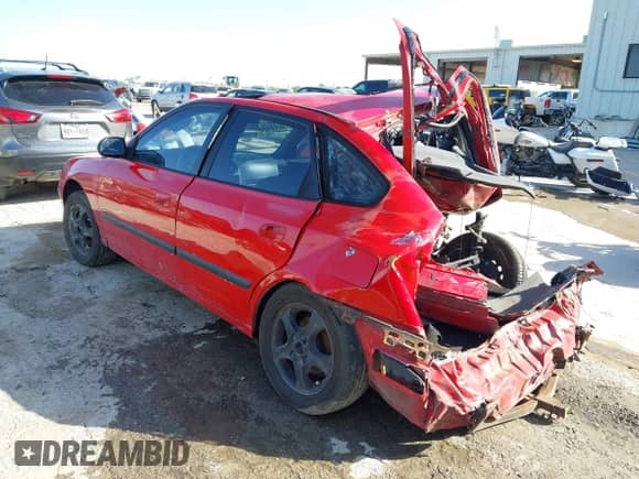 2003 Hyundai Elantra GT z VIN KMHDN55D93U099664, wystawiony jako IAAI lot #42066147 z przebiegiem 194 402 mil mil oraz . Historia ofert i sprzedaży dostępna na DreamBid. Obrazek 3.