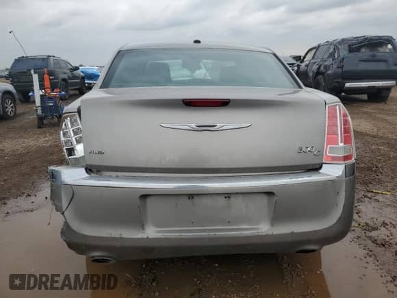 2014 Chrysler 300 C with VIN 2C3CCAKG1EH200994, listed as a Copart auction lot 85164505 with 182,228 mi miles and Salvage title. Bid and sale history available at DreamBid. Image 6.