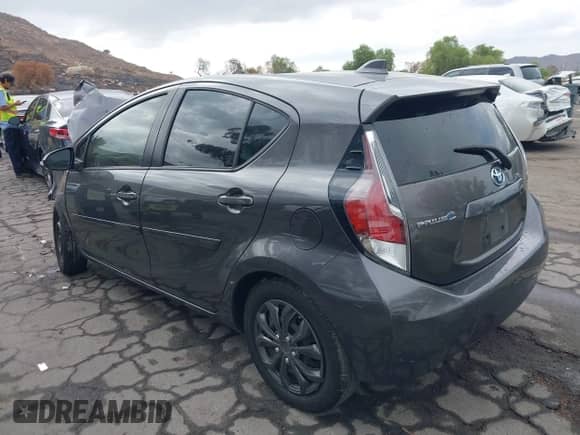 2015 Toyota Prius One z VIN JTDKDTB31F1580917, wystawiony jako IAAI lot #43198076 z przebiegiem 138 011 mil mil oraz . Historia ofert i sprzedaży dostępna na DreamBid. Obrazek 3.