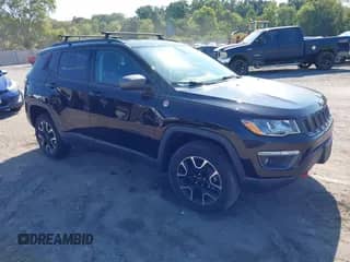 2020 Jeep Compass Trailhawk with VIN 3C4NJDDBXLT100894, listed as a IAAI auction lot 43255124 with 59,502 mi miles and . Bid and sale history available at DreamBid. Image 1.