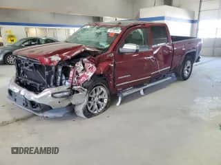 2016 GMC Sierra 1500 SLT with VIN 3GTU2NEC9GG309516, listed as a Copart auction lot 49700285 with 123,187 mi miles and Salvage title. Bid and sale history available at DreamBid. Image 1.