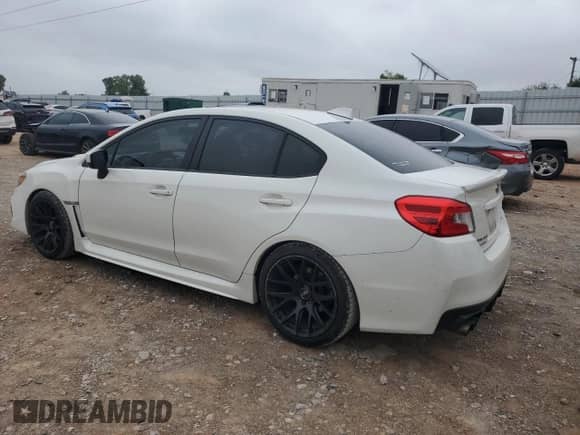 2020 Subaru WRX Premium with VIN JF1VA1C62L9814875, listed as a Copart auction lot 70986585 with 76,047 mi miles and Salvage title. Bid and sale history available at DreamBid. Image 2.
