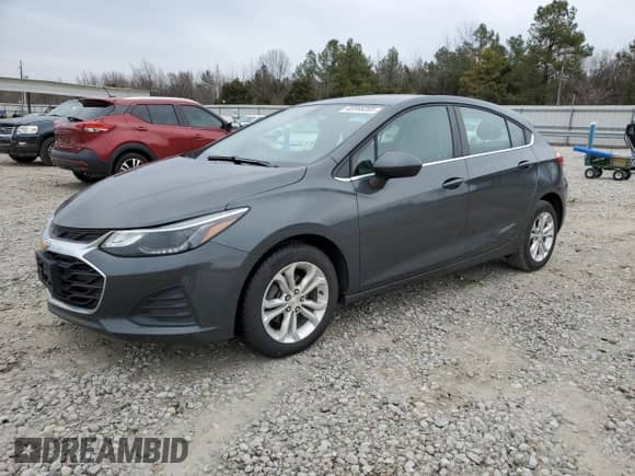 2019 Chevrolet Cruze LT с VIN 3G1BE6SM1KS556898, выставлен на аукционе Copart как лот 45966285 с пробегом 104 932 миль миль и Списание • Salvage title. История ставок и продаж доступна на DreamBid. Изображение 1.